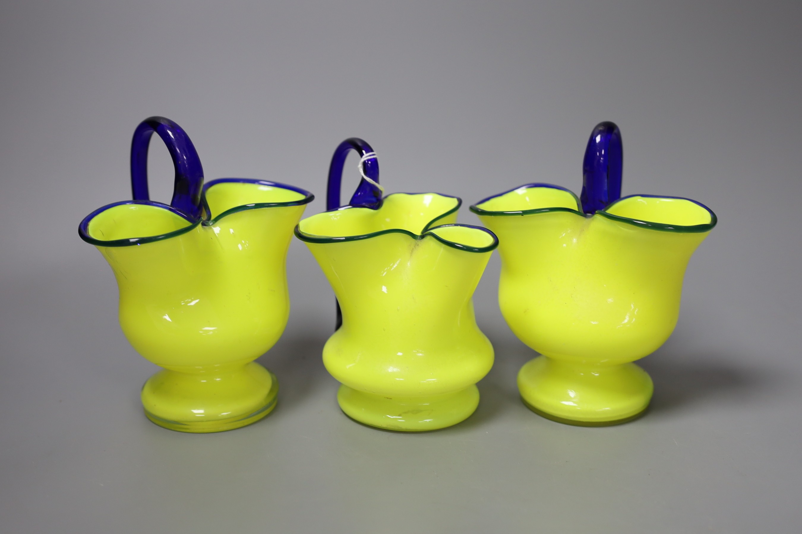 A pair of ruby flashed glass goblets, three ruby and glass pickle jars and other sundry glassware